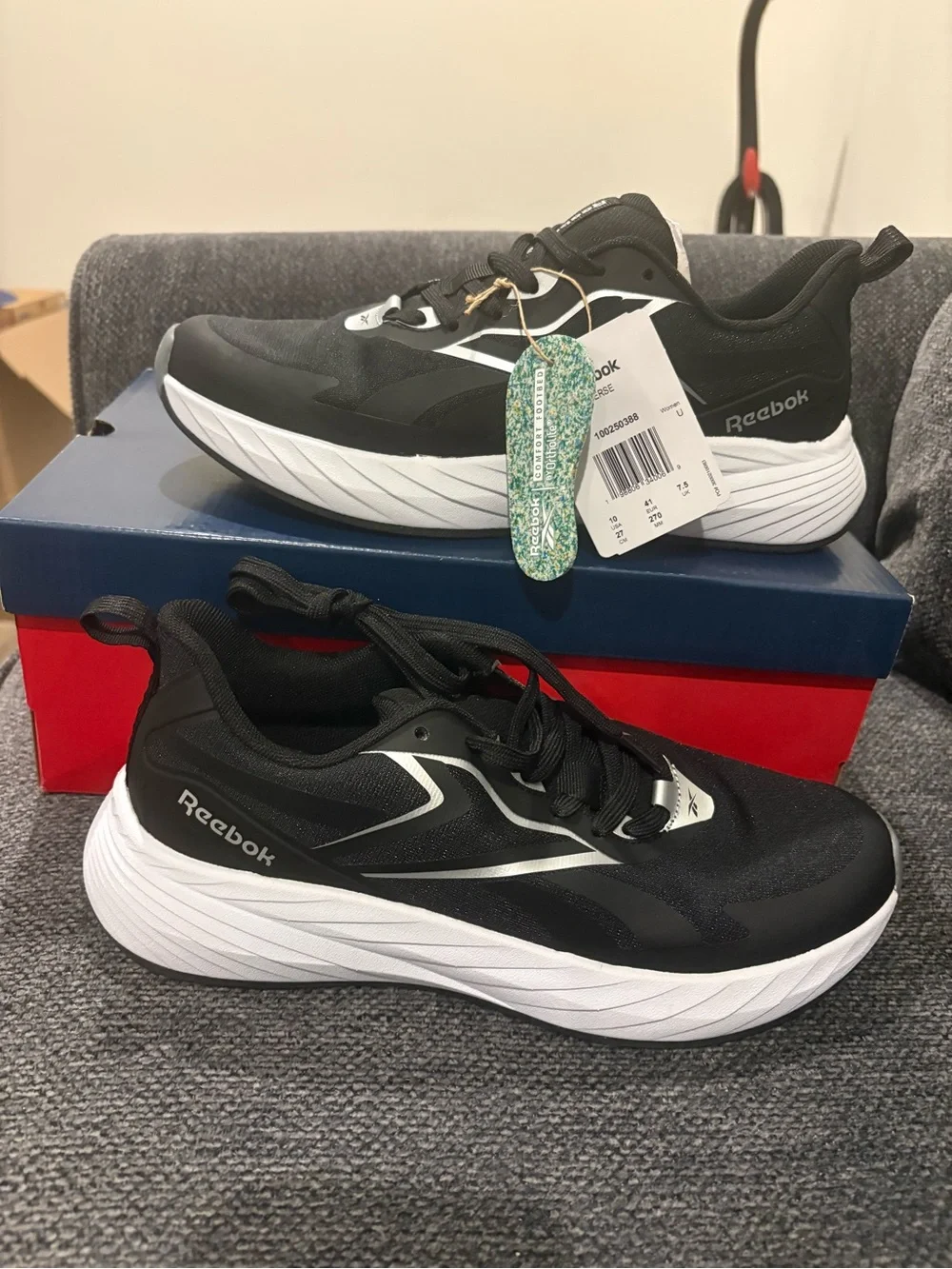 Reebok women  size 10 Black and White Running Sneakers